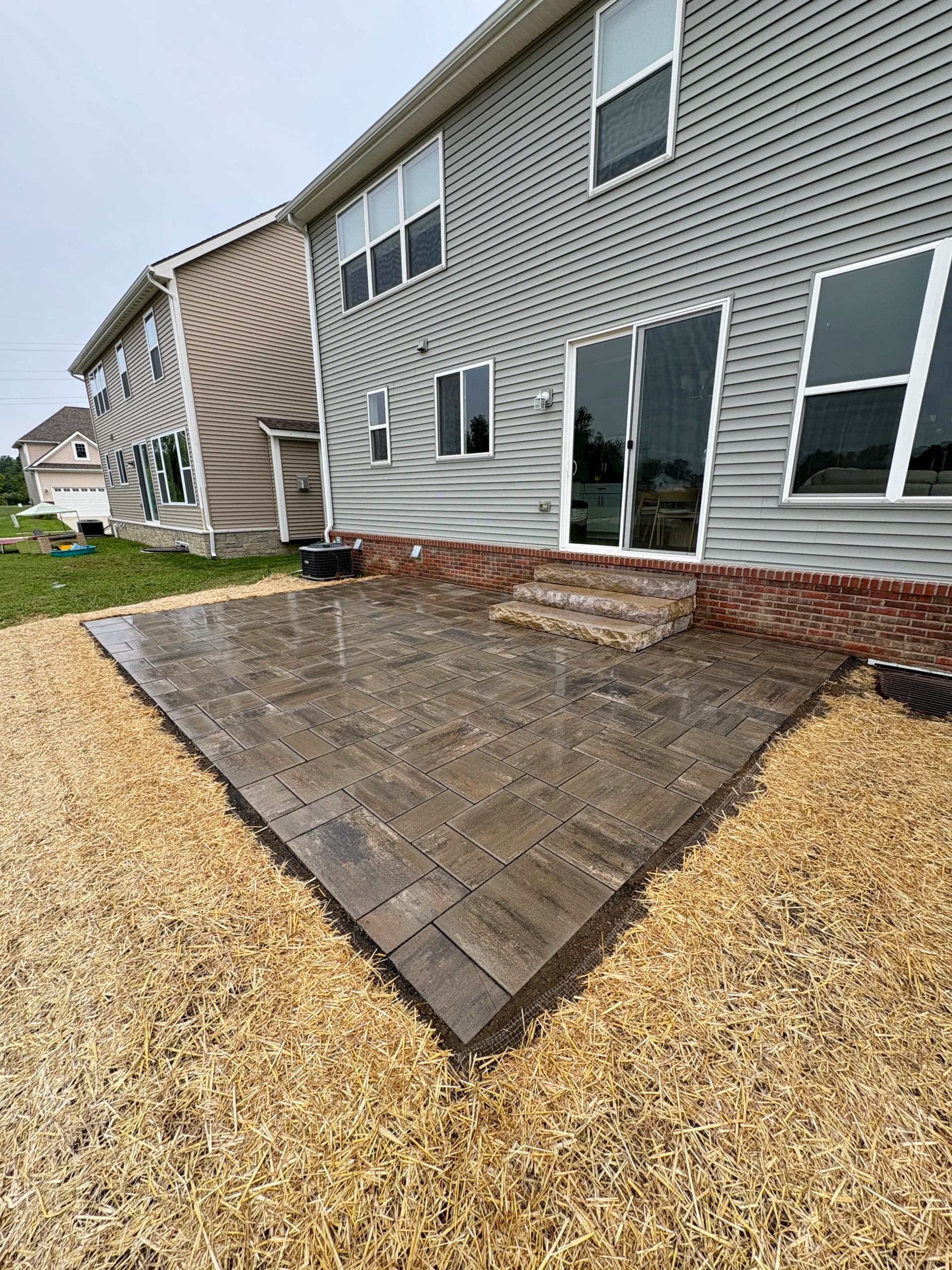 Gallery photos for Backyard Grade Raise and Unilock Beacon Hill Patio Install: Image #1